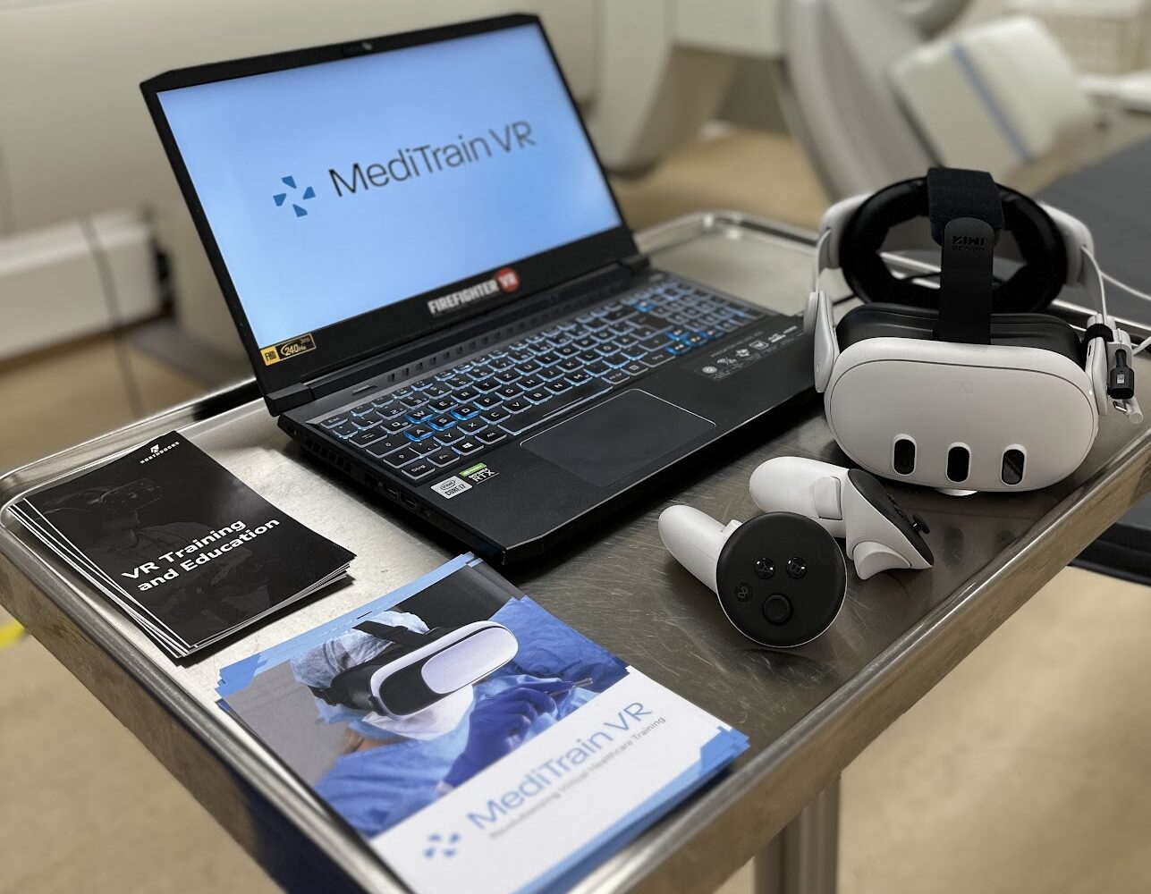 MediTrain VR setup – laptop, Meta Quest headset, and training materials in a clinical environment
